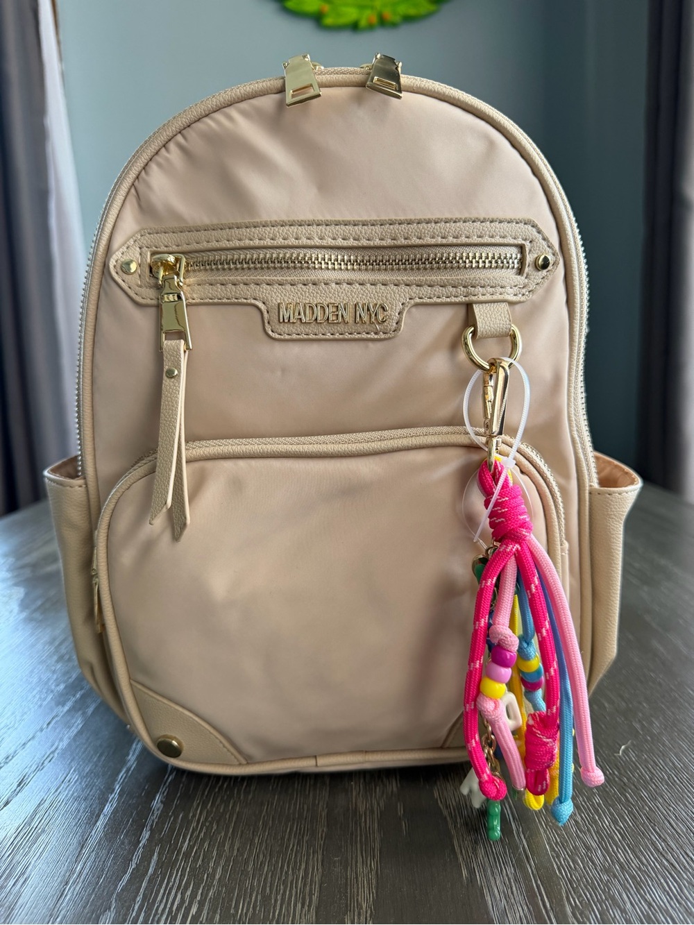 Madden NYC Cream Mini Backpack with Colorful Tassel Charm